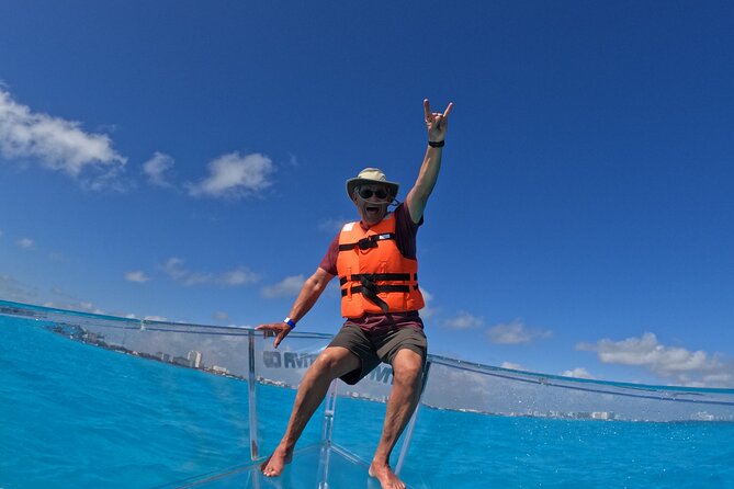 1-hour Clear Boat Tour in Nichupte Lagoon from Cancun - The Extra Cost: Port Tax and Photo Packages