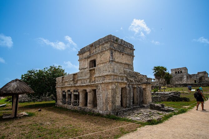 4x1 Tour: Coba Tulum Open Cenote and Playa del Carmen City from Cancun - Stop 1: Tulum Archaeological Site With Seaside Views and Guided Context