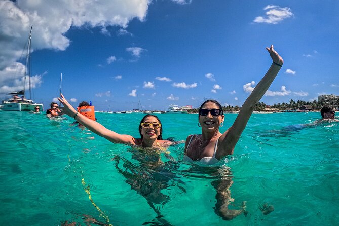All-Inclusive Isla Mujeres Catamaran with Free Transportation - Snorkeling at Arrecife El Meco: gear included, crew-guided spots