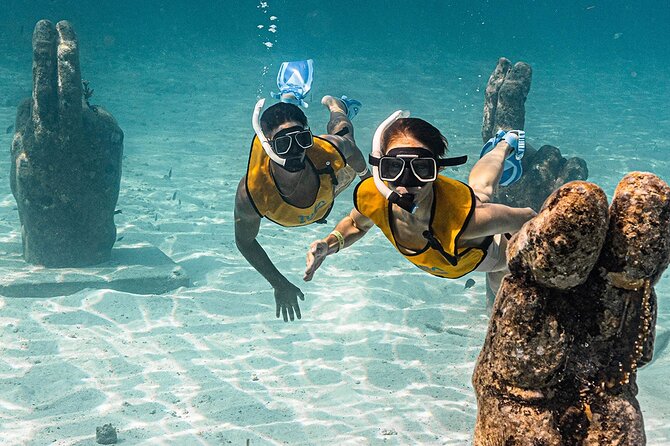 All-Inclusive Isla Mujeres Catamaran with Free Transportation - Downtown Isla Mujeres free time: tequila tasting and a short, sweet explore window