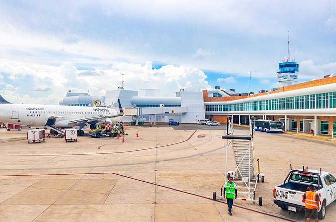 Cancun Airport and Temptation Cancun Resort Private Shuttle - At Cancun Airport: meeting point, sign, and luggage help