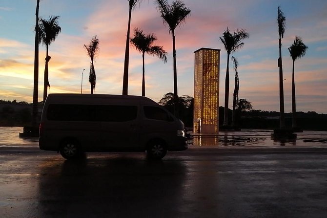 Cancun Airport Transfers - Private Van ROUND TRIP - Finding Your Driver Right Outside the Cancun Terminal
