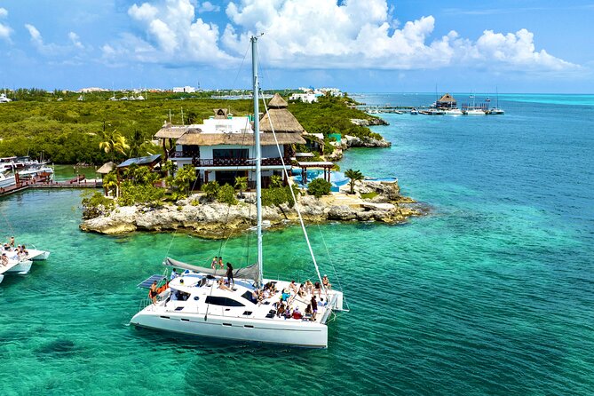 Cancun Catamaran: Isla Mujeres, Snorkeling, Drinks & Buffet Lunch - Cancun Catamaran Basics, route, timing, and who it fits