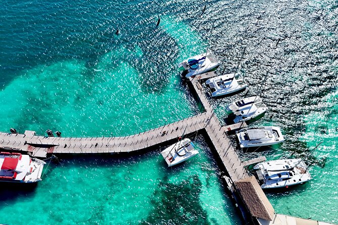 Cancun Catamaran: Isla Mujeres, Snorkeling, Drinks & Buffet Lunch - Getting There: Playa Tortugas Marina and hotel pickup