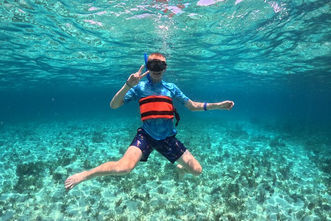 Cancún Catamaran to Isla Mujeres + Snorkel, Open Bar & Lunch - Isla Mujeres Time: Playa Norte and Playa Centro, With Crowd Management