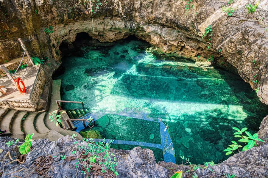 Cancun: Cenotes El Retoño entrance with transport, food, and guided tour. - Pools, hammocks, sports fields, and why free time matters
