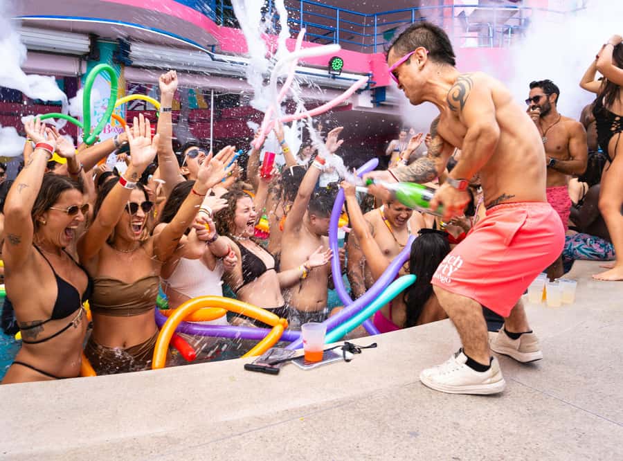 Cancun: Coco Bongo Spring Break Beach Party with Open Bar - The afternoon format, DJ music, contests, and nonstop snacks