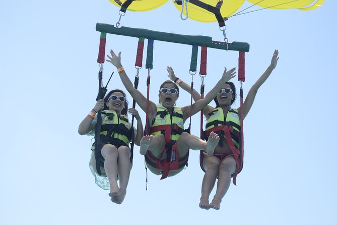 Cancun Combo Adventure: 4-Reef Stop Snorkeling and Parasail Ride - Cancun from two angles, reefs and the sky