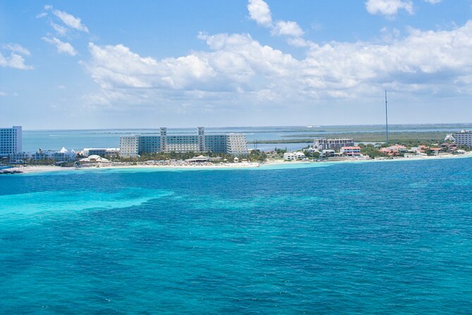Cancun Combo Adventure: 4-Reef Stop Snorkeling and Parasail Ride - Safety first: assistance patrol and how to call it early