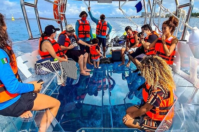Cancun Glass Boat Sightseeing Cruise - The onboard vibe: small group, beers included, and photo moments