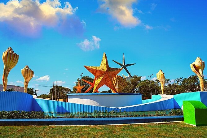 Cancun Guided Bus City Tour (from Cancun and Riviera Maya) - Playa Delfines and the Cancun Sign: Photos, Heat, and Time Pressure
