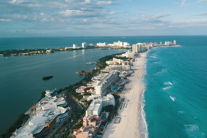 Cancun Guided Sightseeing, Shopping and Tasting Tour - First stop: hotel pickup, van ride, and a quick Playa Delfines break