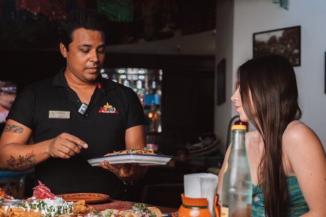 Cancun: Guided Unlimited Taco Lunch & Shopping Experience - Pickup, A/C vans, and the Playa Delfines photo moment