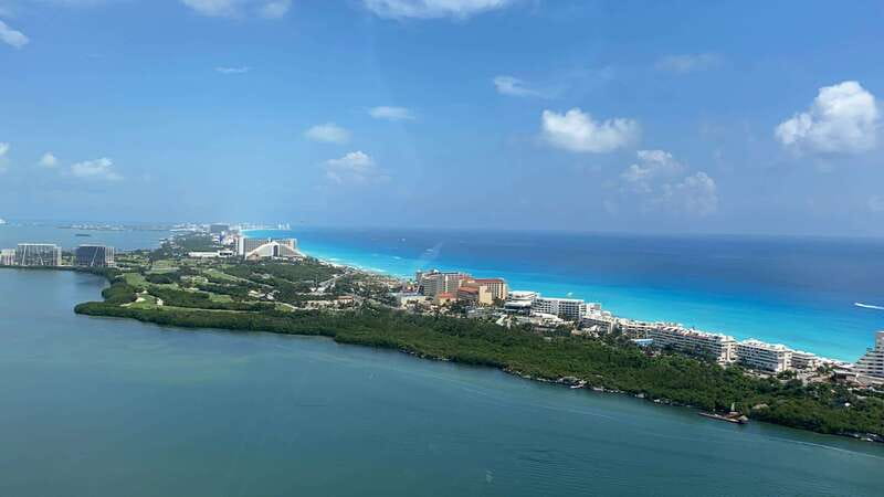 Cancun Hotel Zone: Panoramic Flight - Boarding and Crew: What the Flight Feels Like