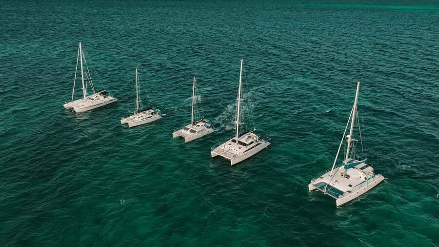 Cancun: Isla Mujeres Adults Only Party Catamaran with Drinks - The catamaran ride: open bar on the water and DJ energy