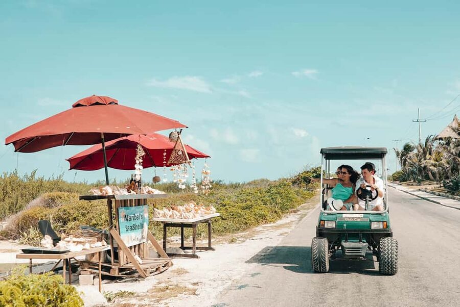 Cancun: Isla Mujeres Adults Only Party Catamaran with Drinks - IXI Beach Club lunch: where the day shifts from boat to sand