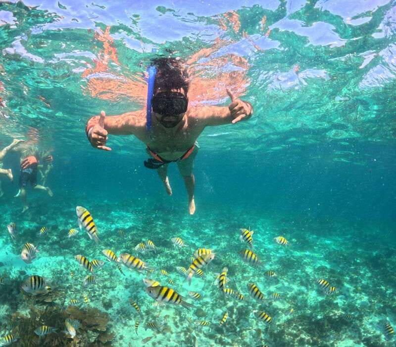 Cancun: Isla Mujeres Catamaran + Coco Bongo Show - Sunset sail with piña colada, then head to Coco Bongo