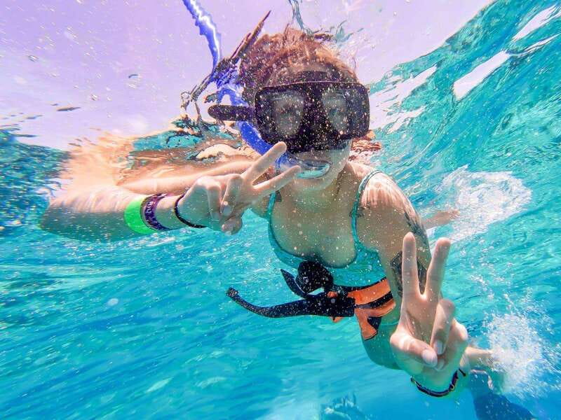 Cancun: Isla Mujeres Catamaran Tour with Open Bar of Drinks - Snorkeling at the reef: the highlight, with real limits