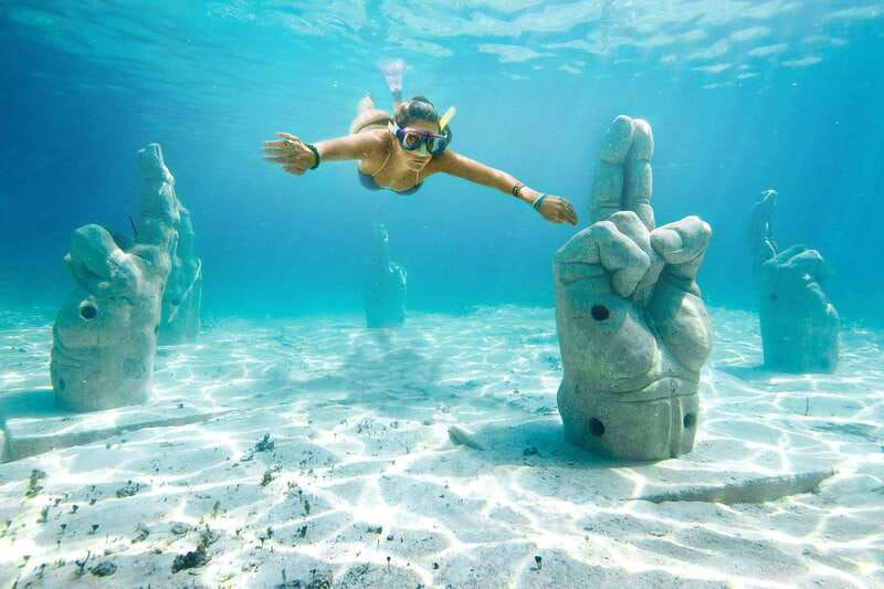 Cancun: Isla Mujeres Catamaran with buffet lunch & open bar - Catamaran Comfort From Cancun, Then Right Into the Water