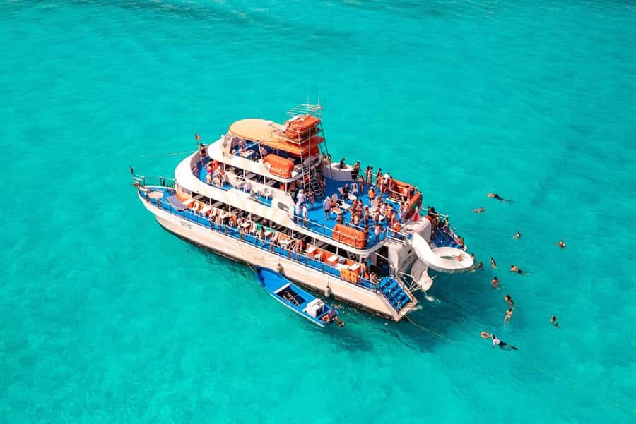 Cancun: Isla Mujeres Full Day Dancer Cruise - A 3-Story Party Catamaran Off Cancun
