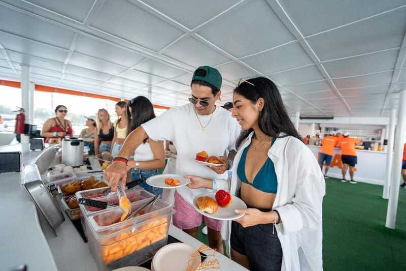 Cancun: Isla Mujeres Full Day Dancer Cruise - Isla Mujeres in Two Hours: Shops, Scenery, and Optional Golf Carts