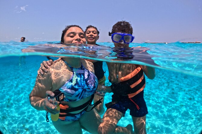 Cancun Private Catamaran to Isla Mujeres with Buffet & Open Bar - Getting on Board at Marina Adventure Bay, Then Leaving the Noise Behind