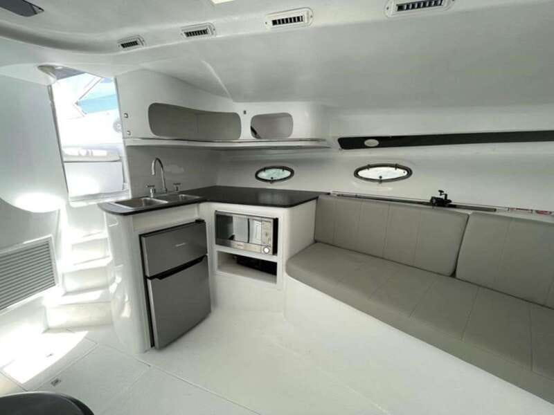 Cancún: Private Yacht Tour - Playa Norte anchoring: the calm, beach, and palm-tree payoff
