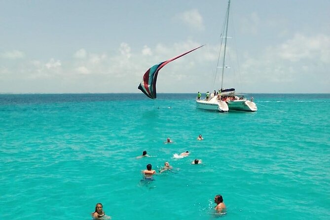 Cancun Sailing Catamaran Islas Mujeres With Luxury Beach Club - Isla Mujeres beach club: pool time, shade, and a buffet lunch that makes the day feel complete
