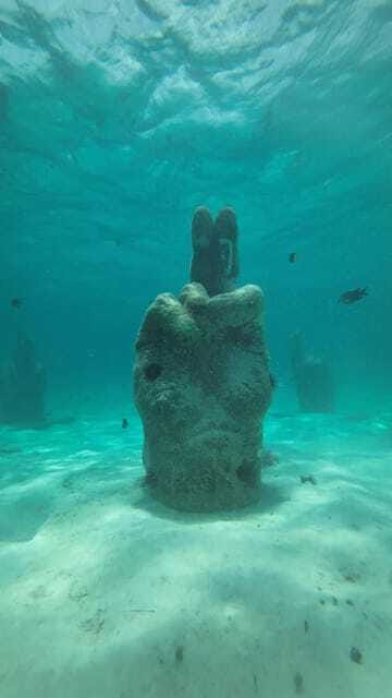 Cancun: Snorkeling Boat Tour with Gear - The shipwreck that feels like a natural turquoise pool