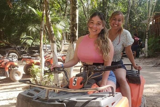 Cancun Wild Day: Zip Lines + ATVs + Cenote + Lunch - Zip lines through foliage, with strict phone rules
