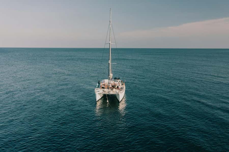 Catamaran Adventure to Isla Mujeres: Snorkeling, Food, and Transportation Included - How the day runs, from pickup to Playa Norte