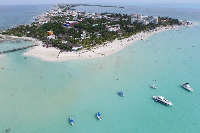 Catamaran adventure to Isla Mujeres with Snorkel,Buffet,Open Bar and Beach Club - The Ride Over to Isla Mujeres: Boat Choice Changes the Feel