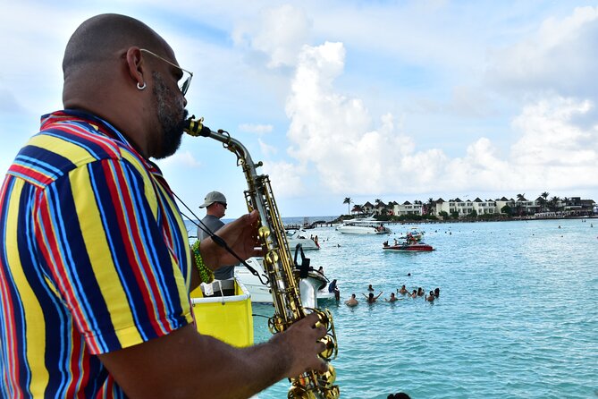 Catamaran Adventure Tour Isla Mujeres Unlimited from Cancun with Transportation - Food, Drinks, and the On-Board Party Pace