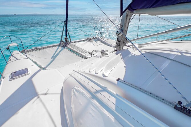 Catamaran Cancun to Isla mujeres Lunch OpenBar and Snorkeling - Lunch at the beach club and the DJ party on the way