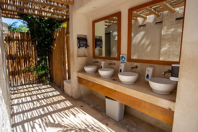 Catamaran family friendly Tour to Isla Mujeres with lunch - Stop 2 at Amazona Beach Bar by Mar-Bella: Lunch, Drinks, and DJ Music