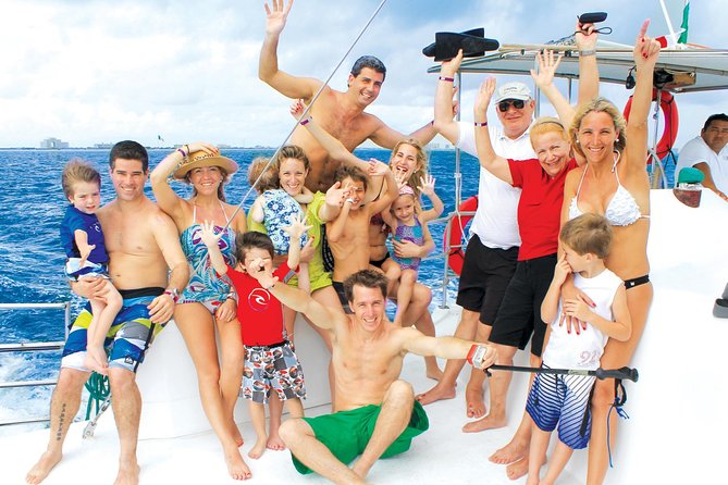 Catamaran Isla Mujeres Tour with Hotel Pick Up included - Beach club lunch plus open bar: the real value boost