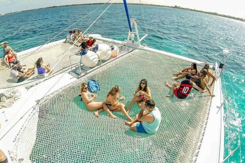 Catamaran party Isla Mujeres with drinks & lunch - A 7-hour party cruise to Isla Mujeres that still gives you a real break