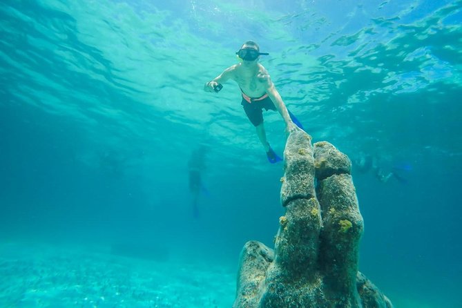 Catamaran Sailing & Snorkeling Experience Isla Mujeres from Playa Del Carmen - Downtown Isla Mujeres and Calle Hidalgo: the quick-shopping sprint
