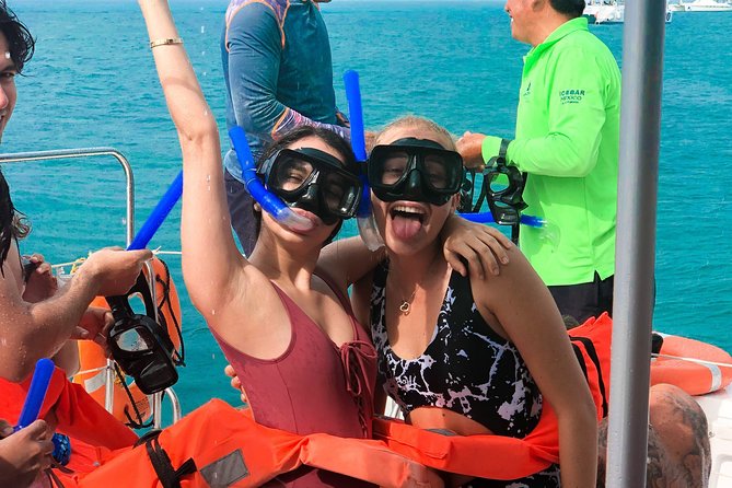 Catamaran Sailing to Isla Mujeres with Snorkeling, Lunch & Open Bar included - Snorkeling on Isla Mujeres reefs: gear is included, crowding is real