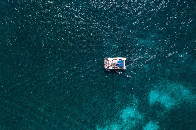 Catamaran Snorkeling with Openbar & Lunch Cancun to Isla Mujeres - Pickup and return rides: where delays can hurt