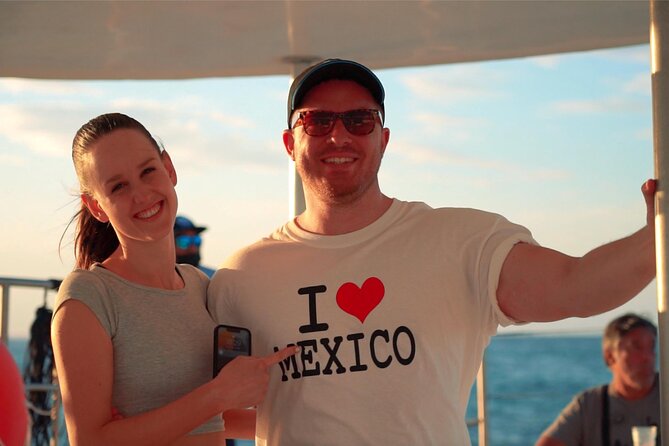 Catamaran Sunset Cruise to Isla Mujeres from Cancun - On-board vibe: sax, party energy, and open bar