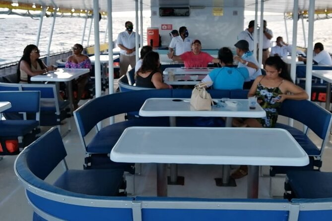 Catamaran to Isla Mujeres at sunset pick up Cancun - Included items vs extra costs, especially that $20 government fee