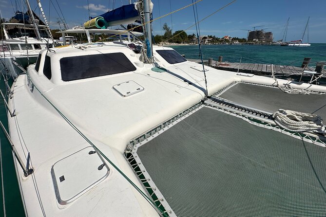 Catamaran to Isla Mujeres – Kids Go Free! (Only Pay Dock Fee) - Downtown Isla Mujeres free time: 90 minutes to wander, shop, and reset