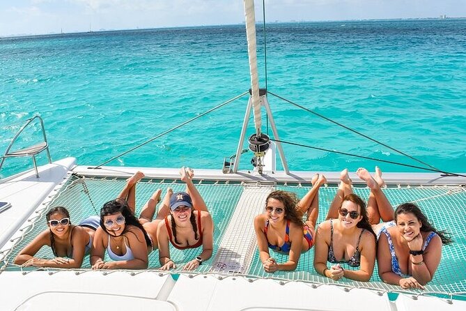 Catamaran to Isla Mujeres Only for Adults - Buffet & DJ at the Beach Club - Marina Albatros check-in and the dock-fee reality