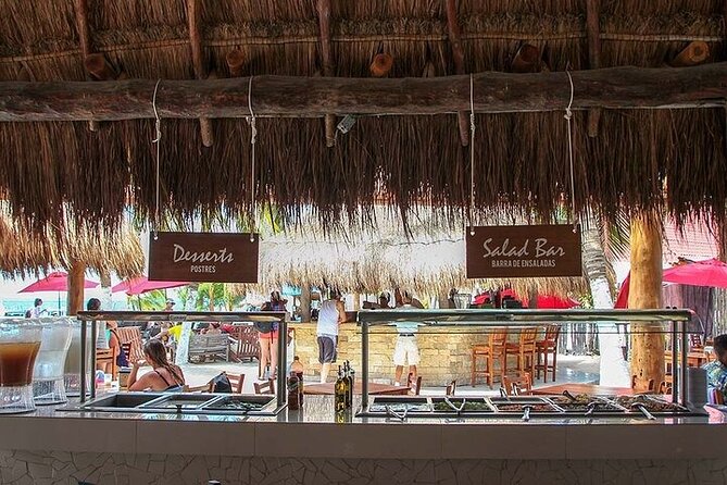 Catamaran to Isla Mujeres Only for Adults - Buffet & DJ at the Beach Club - Snorkeling with provided equipment, and how weather changes the game