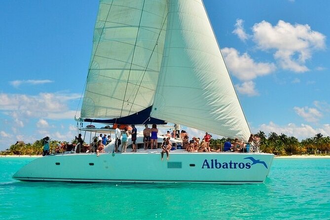 Catamaran to Isla Mujeres Only for Adults - Buffet & DJ at the Beach Club - On the water: catamaran ride plus bar service that saves you time
