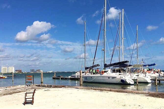 Catamaran to Isla Mujeres, Open bar, buffet, Beach Club Included - Isla Mujeres stop: sailing around the island and using your free time well