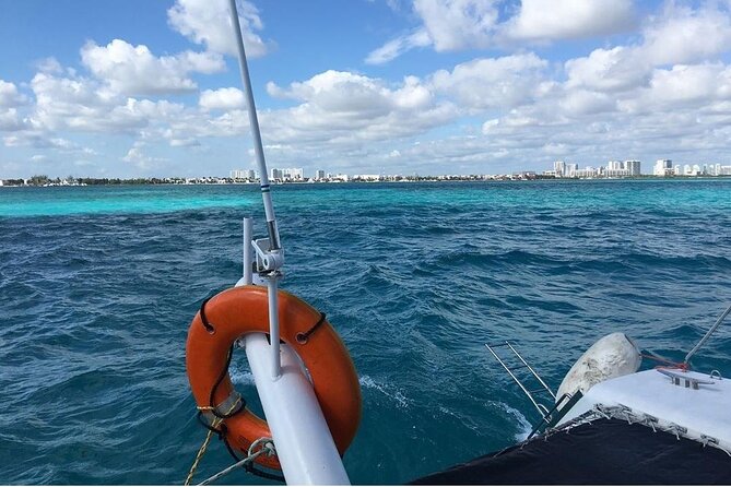 Catamaran to Isla Mujeres, Open bar, buffet, Beach Club Included - Ultramar and Punta Norte: how the 20-minute walk shapes the experience