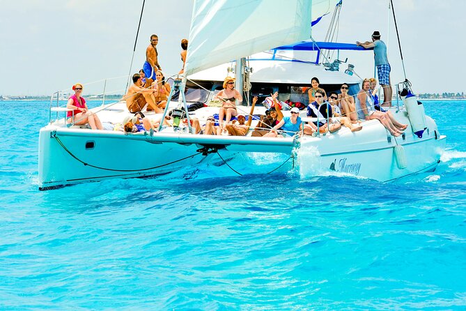 Catamaran to Isla Mujeres Snorkeling Tour with Open Bar and Lunch - Snorkeling near Isla Mujeres: equipment, guides, and reef rules