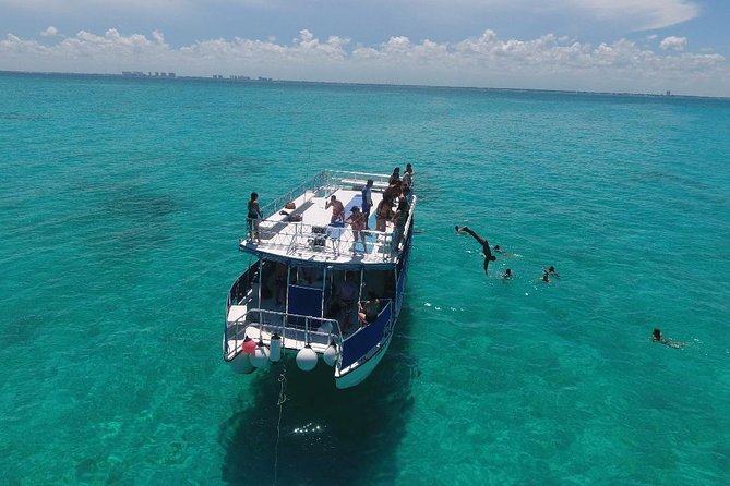 Catamaran Tour to Isla Mujeres all Included - Beach Club Lunch, Unlimited Drinks (Wine Not Included), and the Ice Bar Courtesy